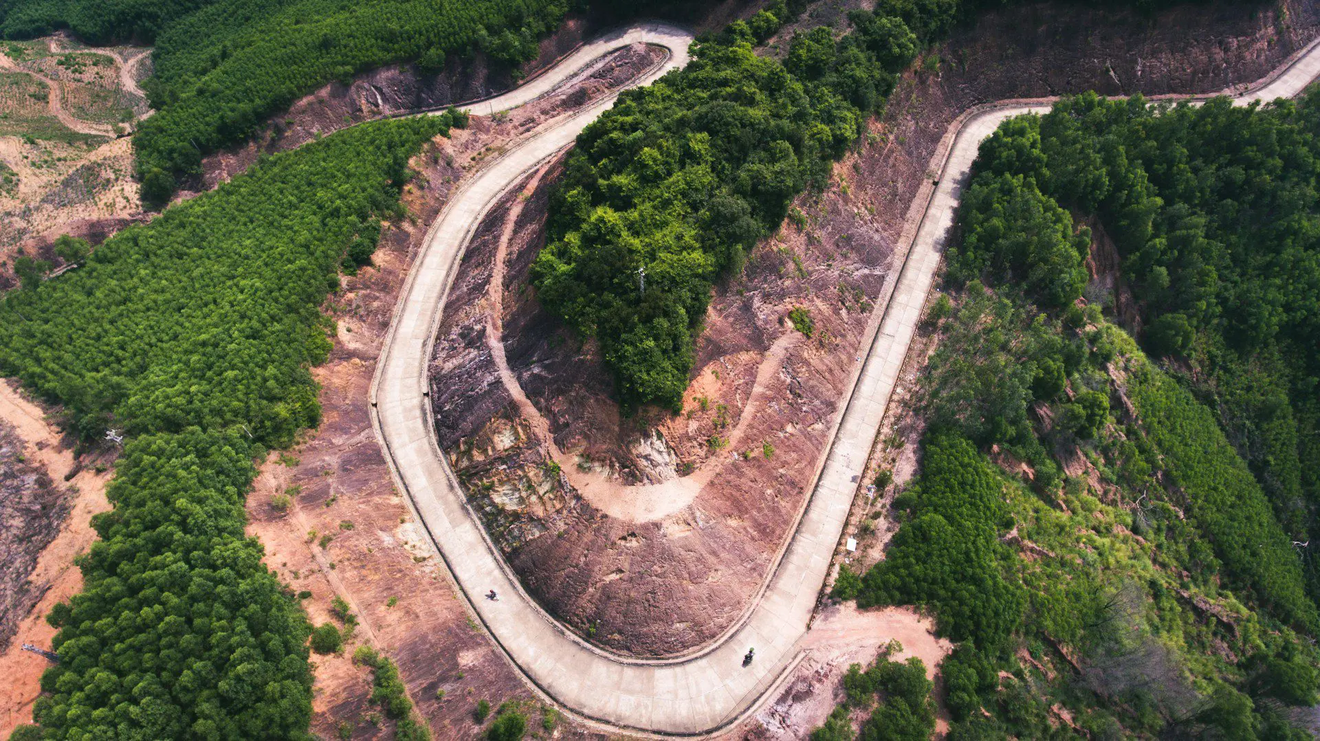 Ariel shot of a winding road in the mountains