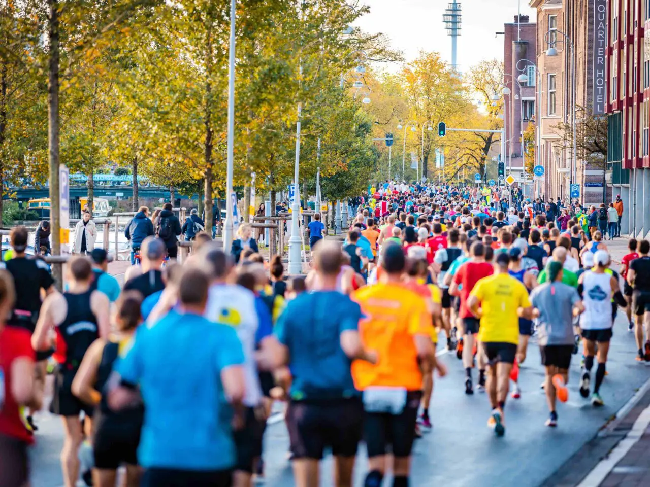 Runners racing along the streets of Amsterdam, during the Amsterdam Marathon